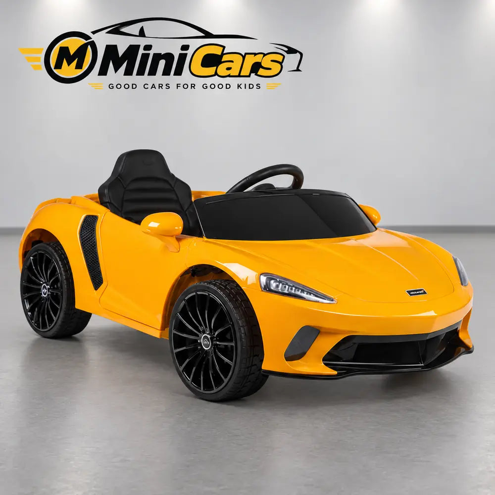 Golden-orange McLaren GT children's electric ride-on car
